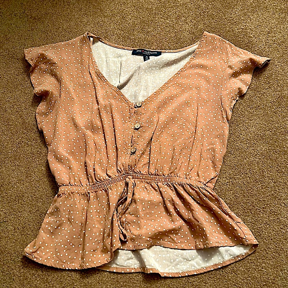 Light brown blouse with white polka dots